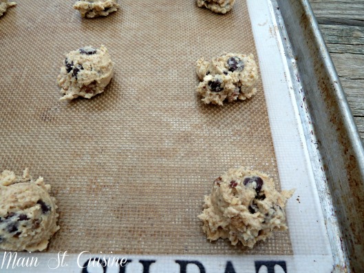 oatmeal chocolate chip cookies on baking sheet